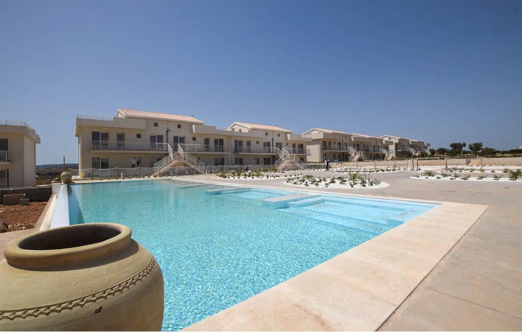 Gönnen Sie sich eine entspannte Auszeit in dieser Ferienwohnung mit Meerblick und Zugang zu einem gemeinschaftlich genutzten Pool.

Diese Wohnung ist klar und gemütlich gestaltet – von der moderne..