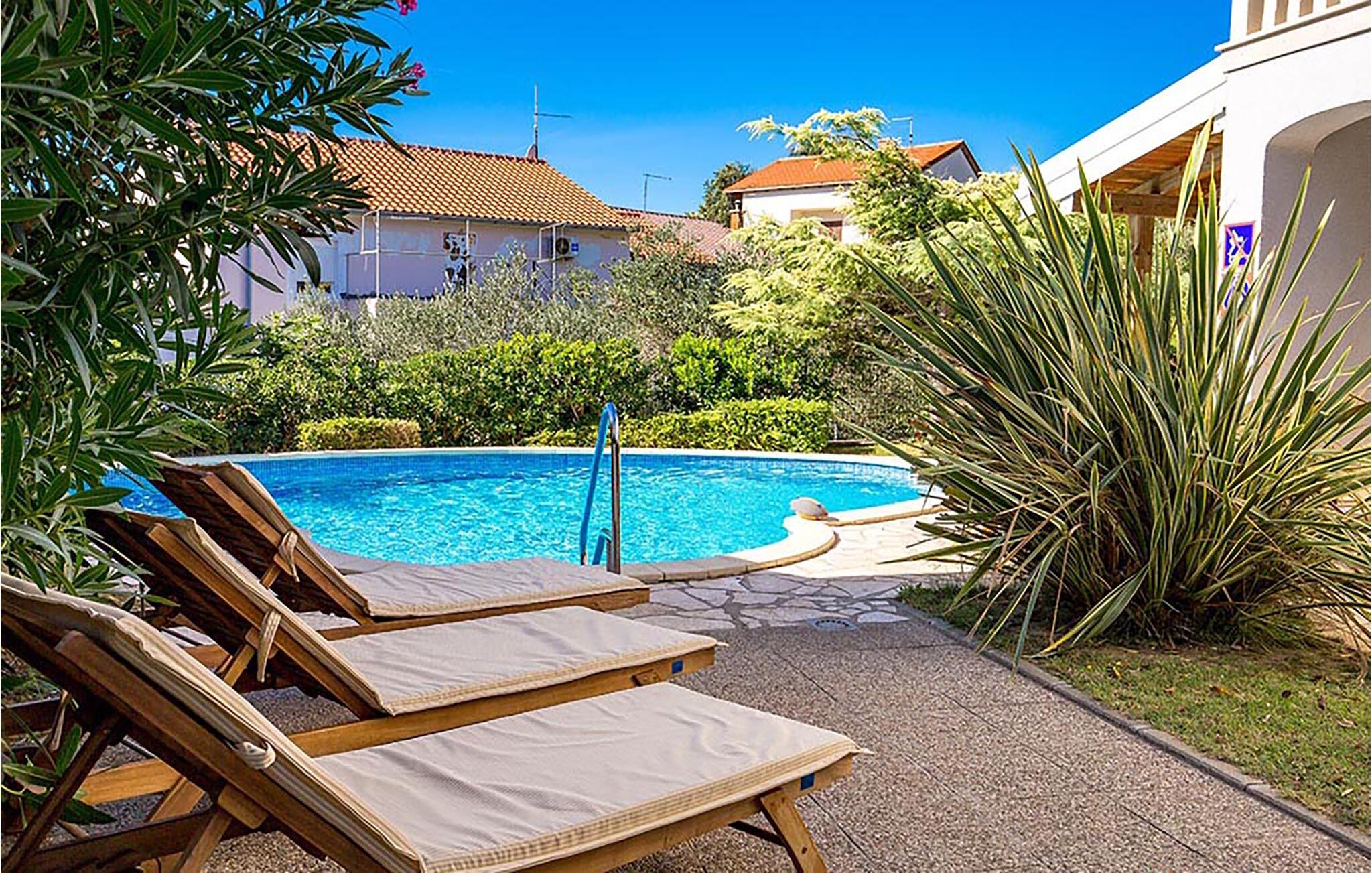 Vakantiehuis met zwembad in Rab-Banjol (Kroatië) voor 4 personen