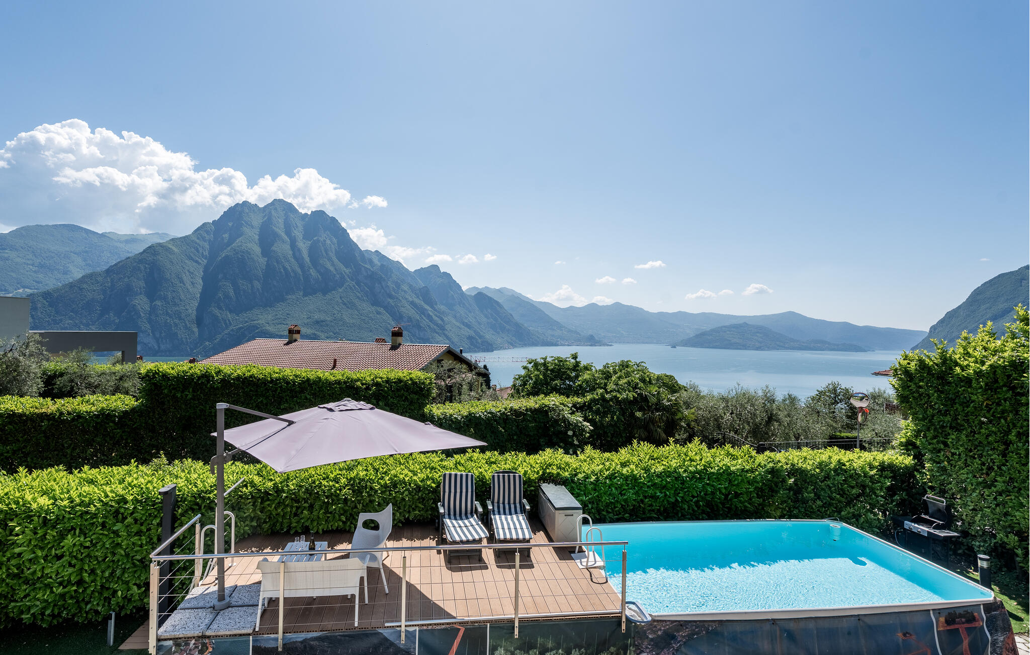 Vakantiehuis met omheinde tuin in Solto Collina (Italië) 1 hond is welkom